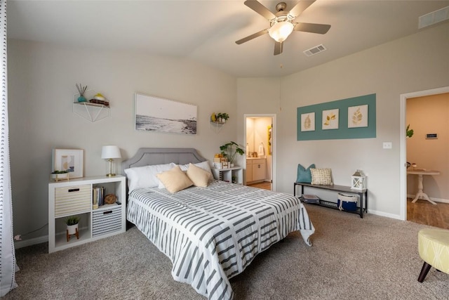 bedroom with baseboards, visible vents, lofted ceiling, and carpet flooring