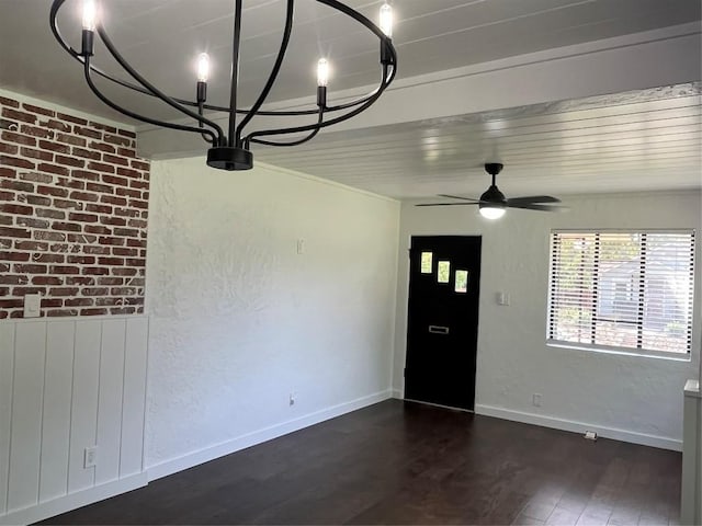5611 Joe Sayers Ave, Austin, TX 78756 - unfurnished dining area featuring dark wood-type flooring, ceiling fan, and baseboards