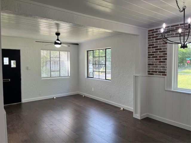 5611 Joe Sayers Ave, Austin, TX 78756 - unfurnished dining area with a textured wall, healthy amount of natural light, a chandelier, dark wood-style floors, and ceiling fan