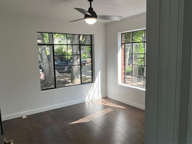 5611 Joe Sayers Ave, Austin, TX 78756 - spare room featuring ceiling fan, baseboards, and wood finished floors