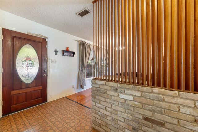 3602 Ferguson Ln, Austin, TX 78754 - foyer with a textured ceiling