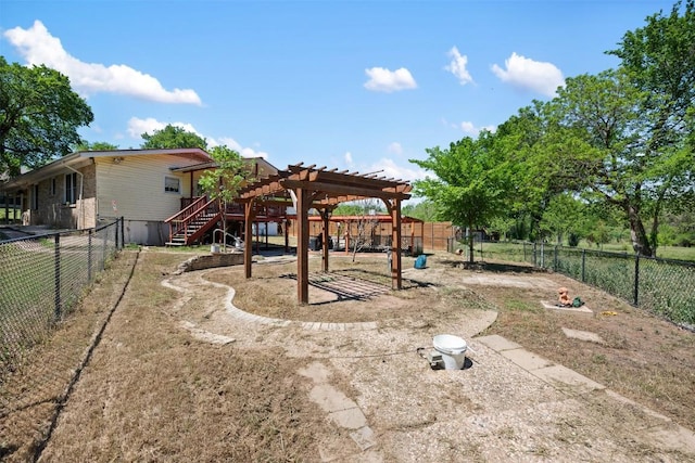 3602 Ferguson Ln, Austin, TX 78754 - fenced backyard with a pergola and stairway