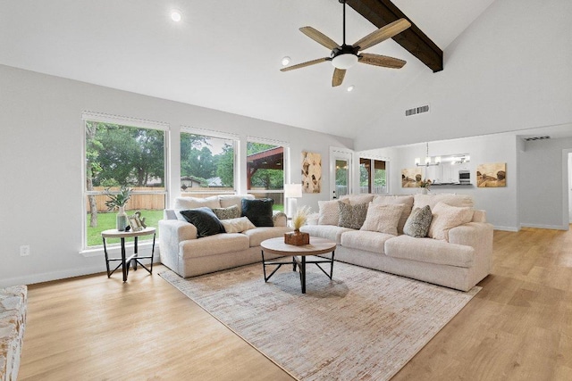10416 Doering Ln, Austin, TX 78750 - living area featuring beamed ceiling, a ceiling fan, high vaulted ceiling, a chandelier, and light wood-type flooring