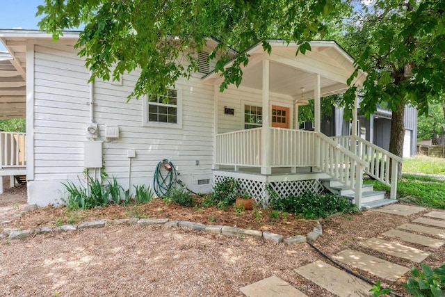 1405 Cometa St, Austin, TX 78721 - view of front of property with covered porch and crawl space