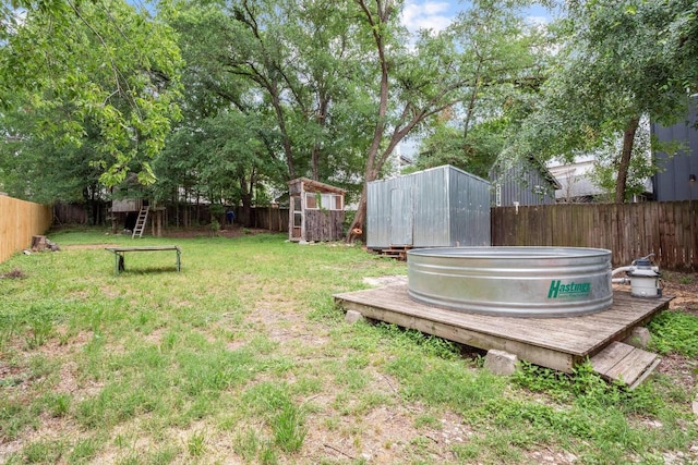 1405 Cometa St, Austin, TX 78721 - fenced backyard featuring a storage shed