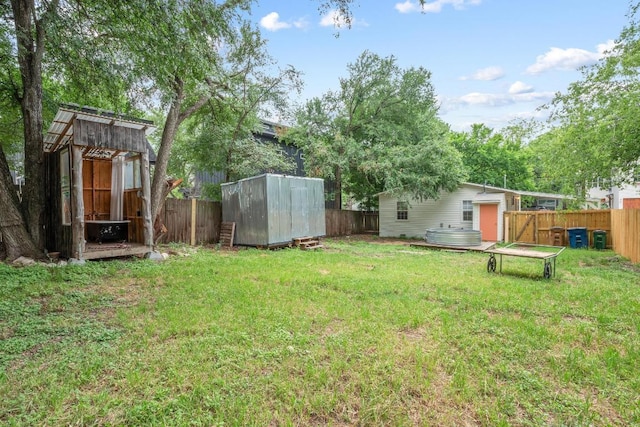 1405 Cometa St, Austin, TX 78721 - fenced backyard with a storage unit