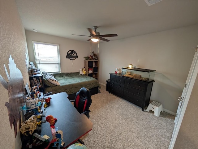 carpeted bedroom featuring a ceiling fan