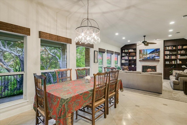505 Newhall Cv, Austin, TX 78746 - dining room featuring built in features, a ceiling fan, light tile patterned flooring, a fireplace, and recessed lighting