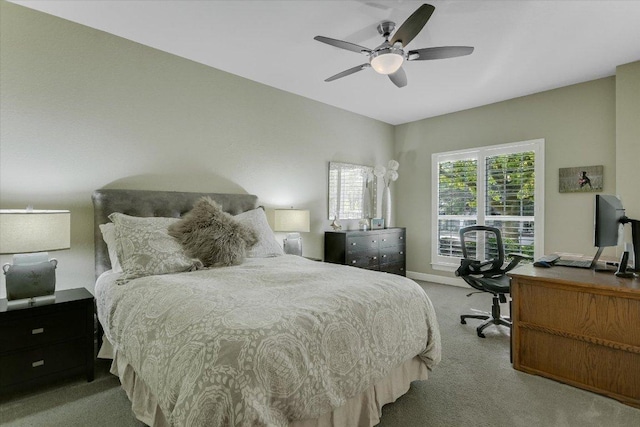 505 Newhall Cv, Austin, TX 78746 - carpeted bedroom with an office area, baseboards, and ceiling fan