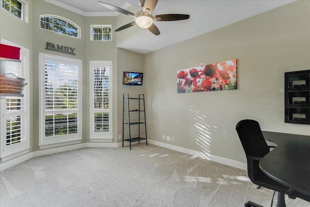 505 Newhall Cv, Austin, TX 78746 - carpeted office featuring a ceiling fan, baseboards, ornamental molding, and a high ceiling