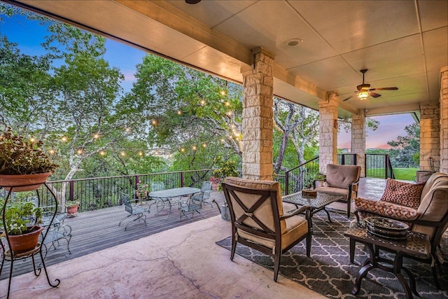 505 Newhall Cv, Austin, TX 78746 - patio terrace at dusk with an outdoor living space and ceiling fan
