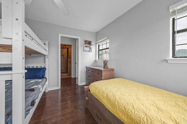 3487 Rust, Spring Branch, TX 78070 - bedroom with wood finished floors, multiple windows, and ceiling fan