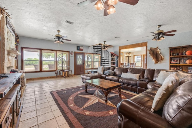 3487 Rust, Spring Branch, TX 78070 - living area with a ceiling fan, a chandelier, light tile patterned flooring, and stairway
