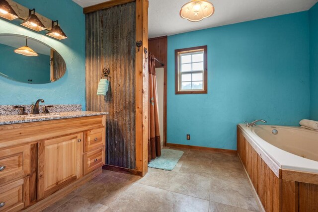 3487 Rust, Spring Branch, TX 78070 - bathroom with a jetted tub, vanity, and a shower