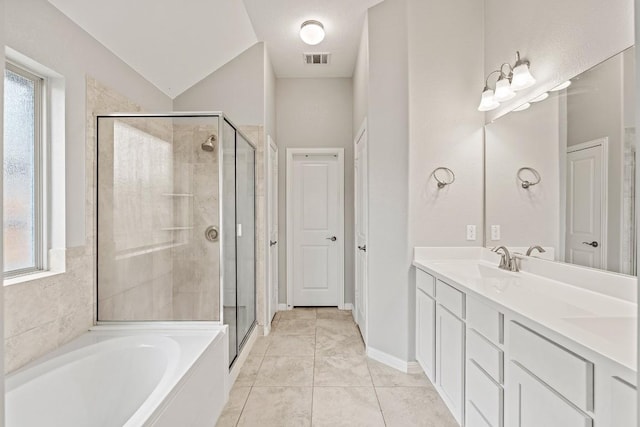 bathroom featuring a shower stall, a sink, double vanity, visible vents, and a bath