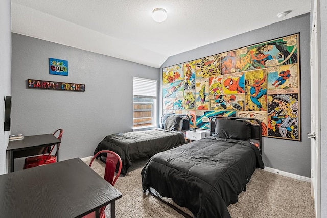 carpeted bedroom with baseboards, lofted ceiling, and a textured wall