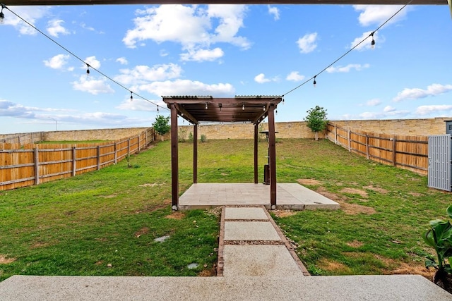 view of yard with a patio and a fenced backyard