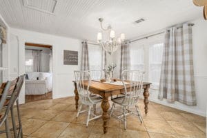 128 E Cedar St, La Grange, TX 78945 - dining space with visible vents and a chandelier
