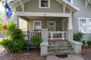 128 E Cedar St, La Grange, TX 78945 - doorway to property featuring a porch