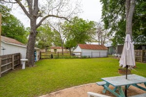 128 E Cedar St, La Grange, TX 78945 - view of yard featuring a patio and a fenced backyard