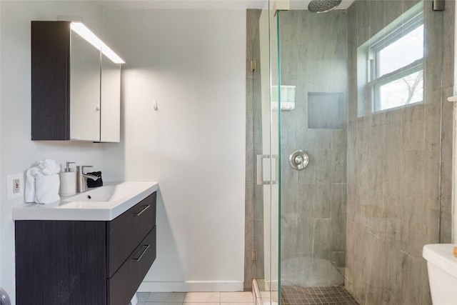 full bathroom with toilet, a stall shower, tile patterned floors, and vanity