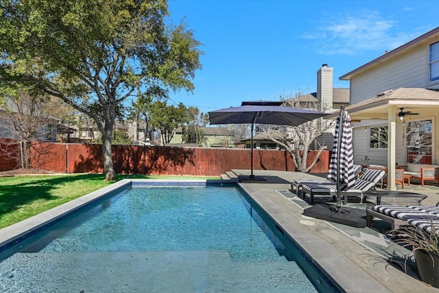 view of swimming pool featuring a fenced in pool, a patio area, and a fenced backyard