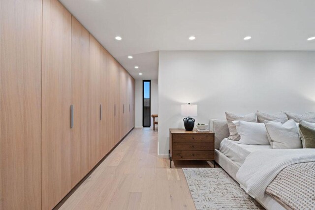 105 Scamper Cv, Lakeway, TX 78734 - bedroom with recessed lighting and light wood-type flooring