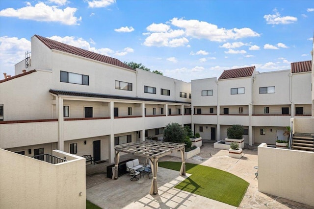 2605 Enfield Rd Unit 209, Austin, TX 78703 - back of house with stucco siding