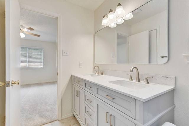 2009 Barnett Dr, Cedar Park, TX 78613 - bathroom with double vanity and ceiling fan