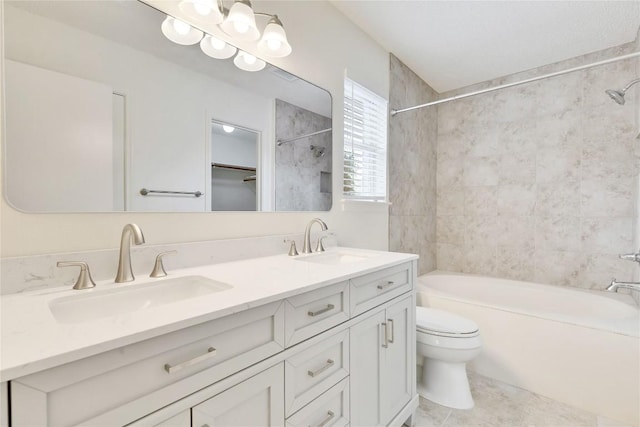 2009 Barnett Dr, Cedar Park, TX 78613 - full bathroom with toilet, shower / tub combination, double vanity, and tile patterned flooring