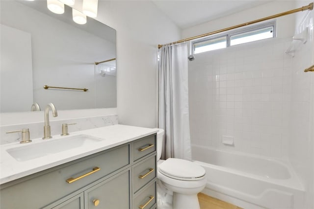 2009 Barnett Dr, Cedar Park, TX 78613 - bathroom featuring toilet, vanity, and shower / tub combo