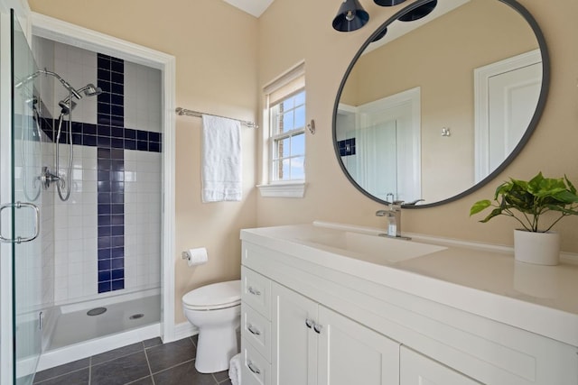 3207 Crystal Falls Pkwy, Leander, TX 78641 - full bath featuring vanity, toilet, tile patterned flooring, and a stall shower