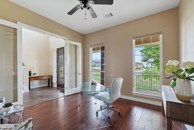 3207 Crystal Falls Pkwy, Leander, TX 78641 - home office with wood-type flooring, french doors, a ceiling fan, baseboards, and visible vents