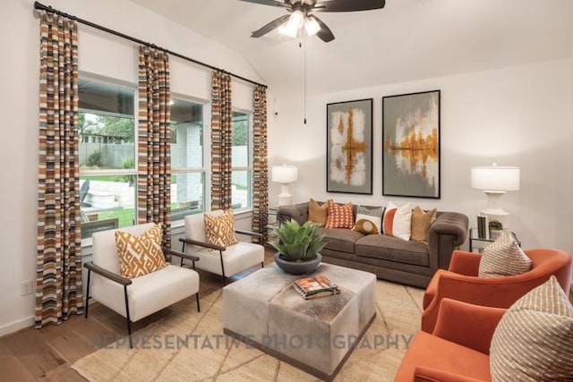 321 Dycus Bnd, Liberty Hill, TX 78642 - living room with wood finished floors, vaulted ceiling, and ceiling fan