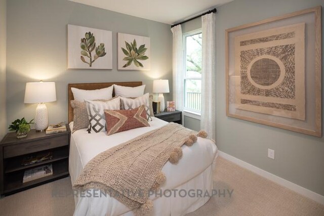 321 Dycus Bnd, Liberty Hill, TX 78642 - bedroom featuring carpet floors and baseboards