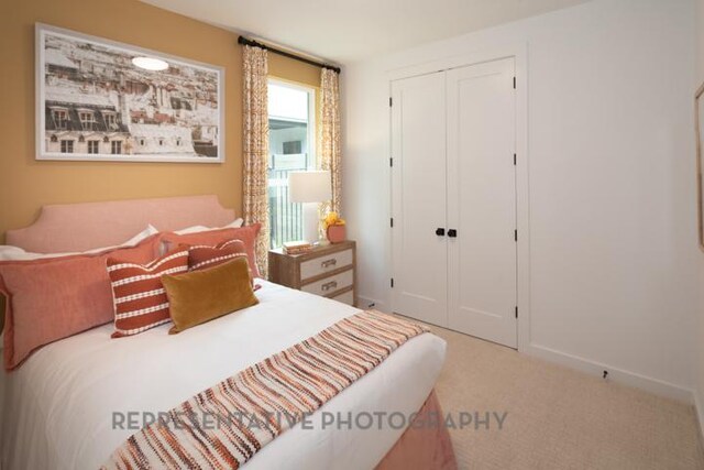 321 Dycus Bnd, Liberty Hill, TX 78642 - carpeted bedroom featuring a closet and baseboards