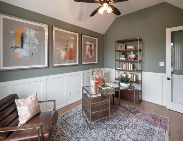 321 Dycus Bnd, Liberty Hill, TX 78642 - office space featuring wood finished floors, a ceiling fan, lofted ceiling, a wainscoted wall, and a decorative wall