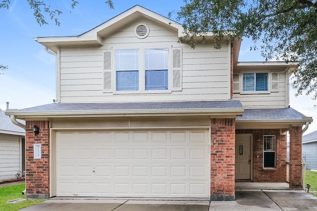 17928 Honey Locust Ln, Elgin, TX 78621 - view of front of home with brick siding, an attached garage, and driveway