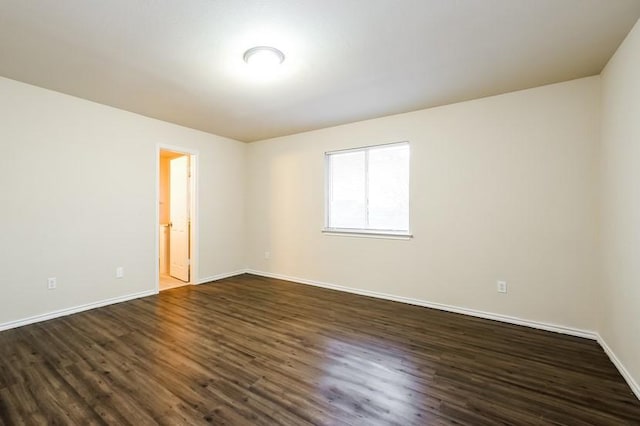 17928 Honey Locust Ln, Elgin, TX 78621 - unfurnished room featuring dark wood-style floors and baseboards