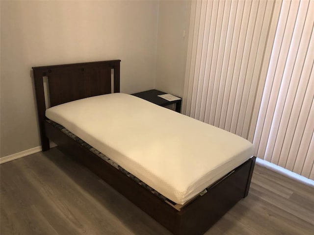2815 Rio Grande St Unit 201, Austin, TX 78705 - bedroom with wood finished floors and baseboards