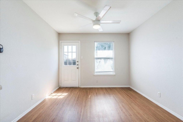 109 David Dr, Hutto, TX 78634 - unfurnished room with light wood-type flooring, baseboards, and ceiling fan