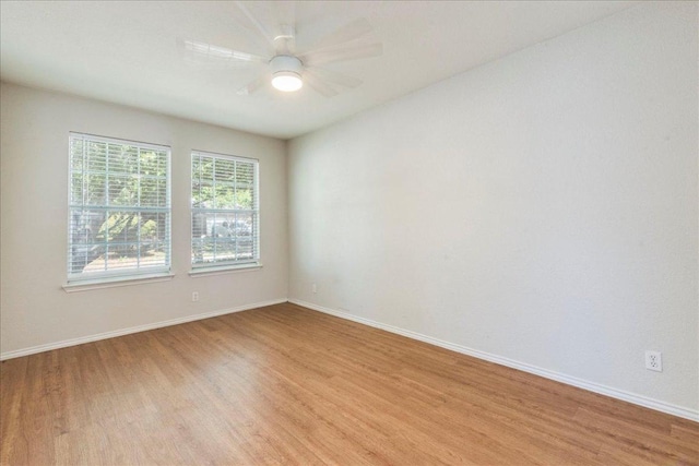 109 David Dr, Hutto, TX 78634 - unfurnished room featuring light wood-style flooring, baseboards, and a ceiling fan