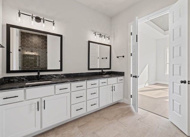 109 Flora Springs Cv, Liberty Hill, TX 78642 - bathroom with double vanity and tiled shower