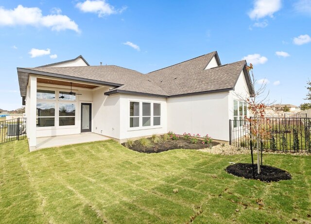 109 Flora Springs Cv, Liberty Hill, TX 78642 - back of house featuring a shingled roof, stucco siding, a patio, and ceiling fan