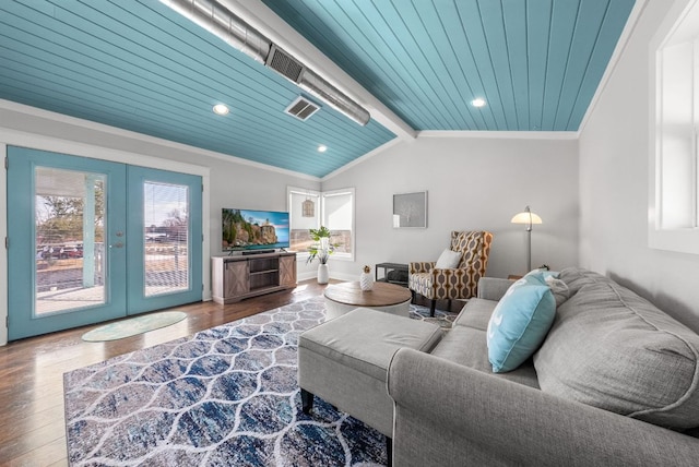 living area featuring wood ceiling, visible vents, french doors, lofted ceiling with beams, and wood finished floors