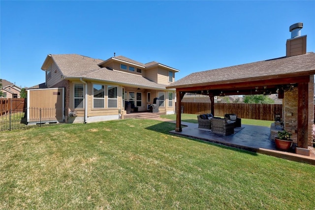 rear view of property with outdoor lounge area, a patio, a fenced backyard, and a yard