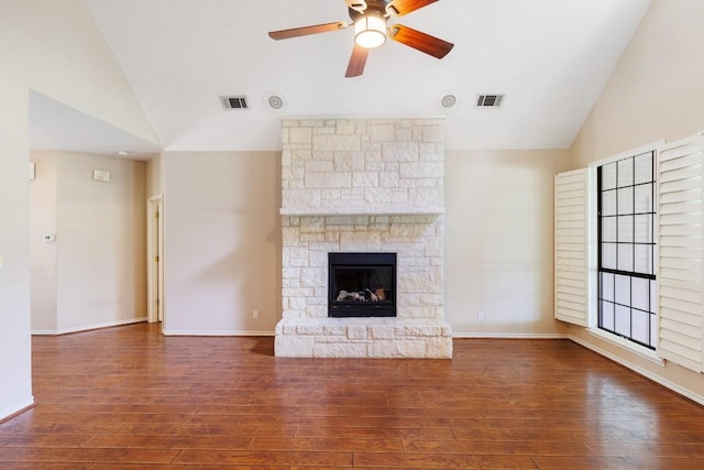 unfurnished living room featuring visible vents, hardwood / wood-style floors, and lofted ceiling