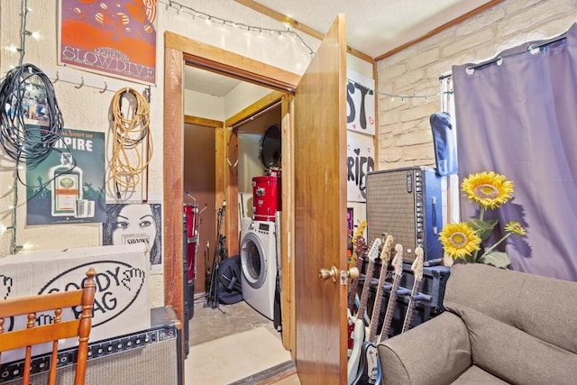 interior space featuring washer / clothes dryer and concrete flooring