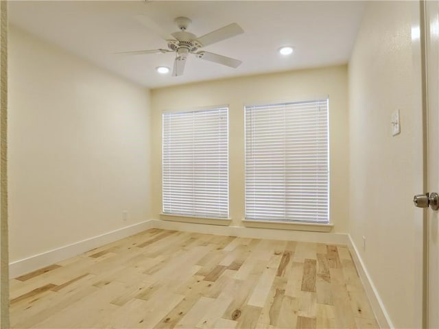 unfurnished room featuring ceiling fan, light wood-type flooring, recessed lighting, and baseboards