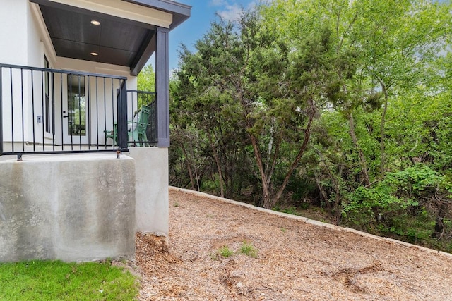 view of side of property with stucco siding